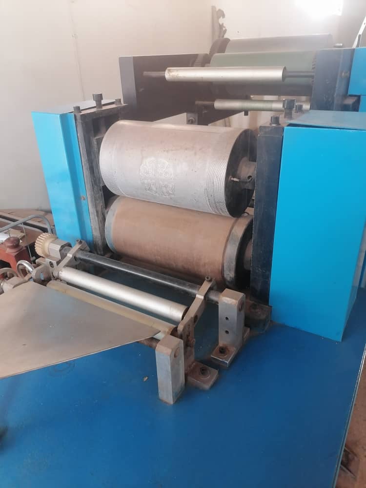 Napkin production machine