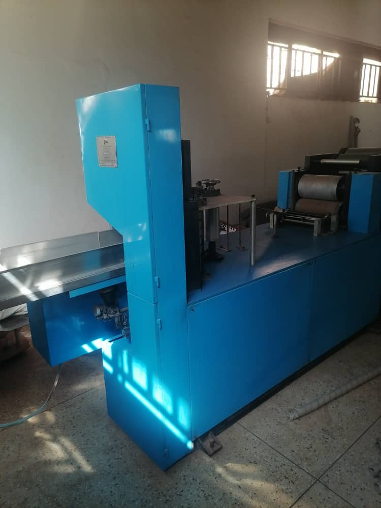 Napkin production machine